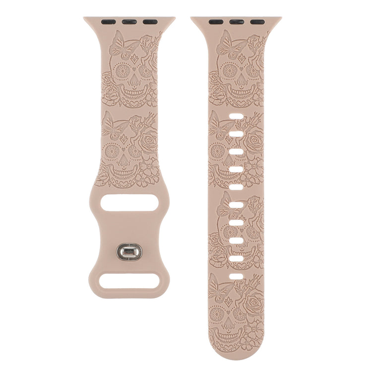 Relief 8-Character Buckle Skull Carving Silicone Watch Strap band with skull and floral designs on a white background