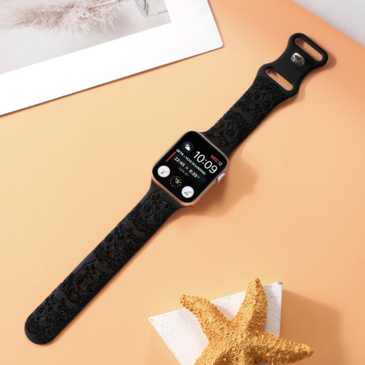 Relief 8-Character Buckle Skull Carving Silicone Watch Strap on a stylish background with a black skull design.
