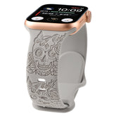 Relief 8-Character Buckle Skull Carving Silicone Watch Strapwith a decorative skull and floral patterned band on a white background