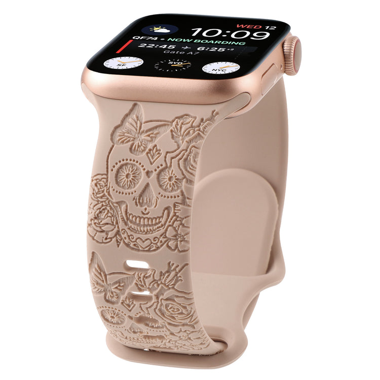 Relief 8-Character Buckle Skull Carving Silicone Watch Strapwith a decorative skull and floral band on a white background