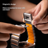 Person adjusting an orange and silver Titanium Norman Magnetic Clasp Ultra3 Watch Strap with text highlighting magnetic design.