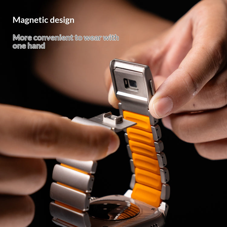Person adjusting an orange and silver Titanium Norman Magnetic Clasp Ultra3 Watch Strap with text highlighting magnetic design.