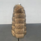 Faux raccoon fur overcoat women displayed on mannequin with long fur stripes in seedling yellow.