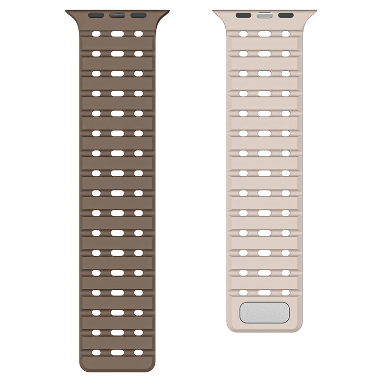 Breathable Magnetic-Attachment Perforated Watch Strap, one brown and one beige with a silver buckle, on a white background.
