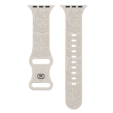 Relief 8-Character Buckle Skull Carving Silicone Watch Strap White floral patterned watch band on a white background